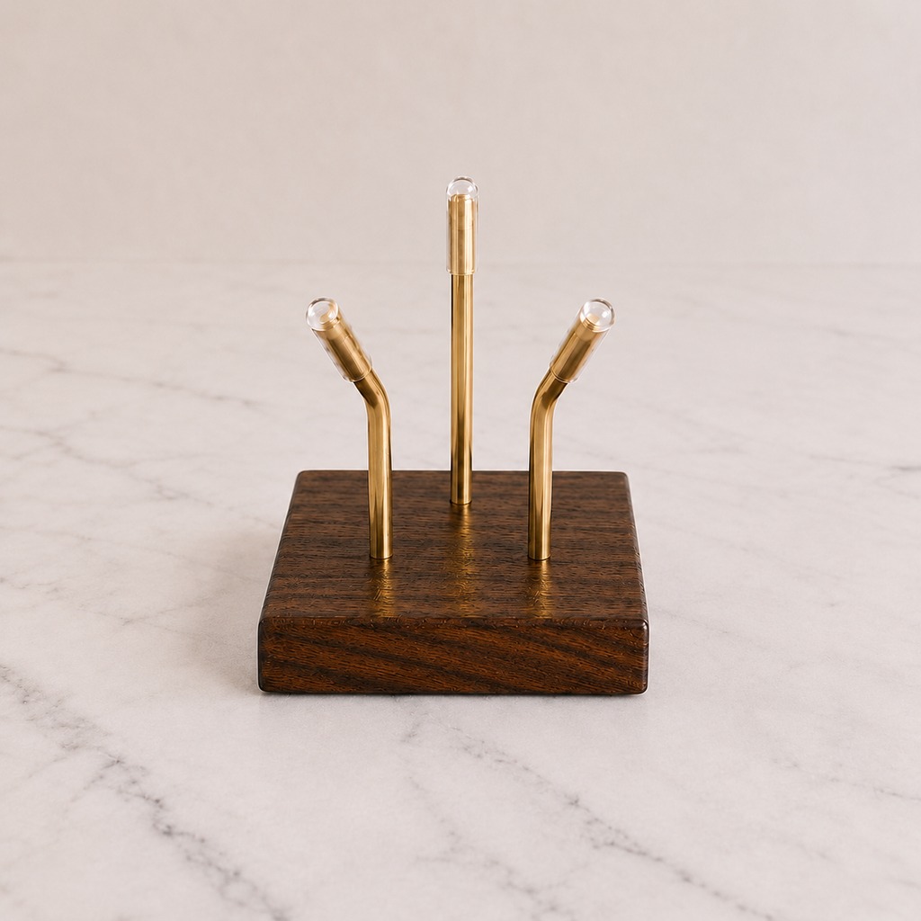Walnut Sculptural Pedestal with brass mounting posts, close-up view