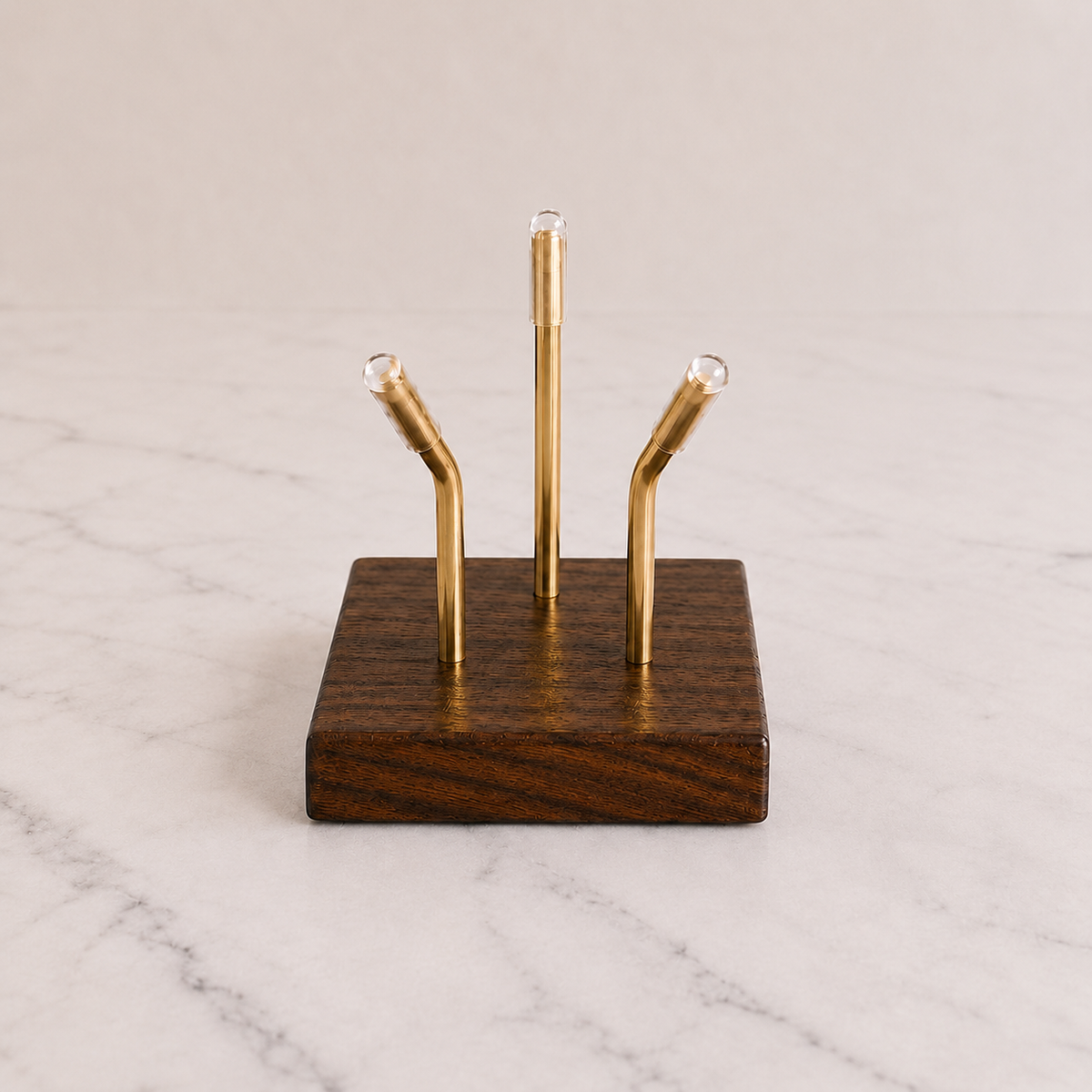 Walnut Sculptural Pedestal with brass mounting posts, close-up view