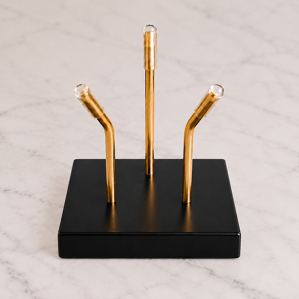 Black Sculptural Pedestal with brass mounting posts, angled view